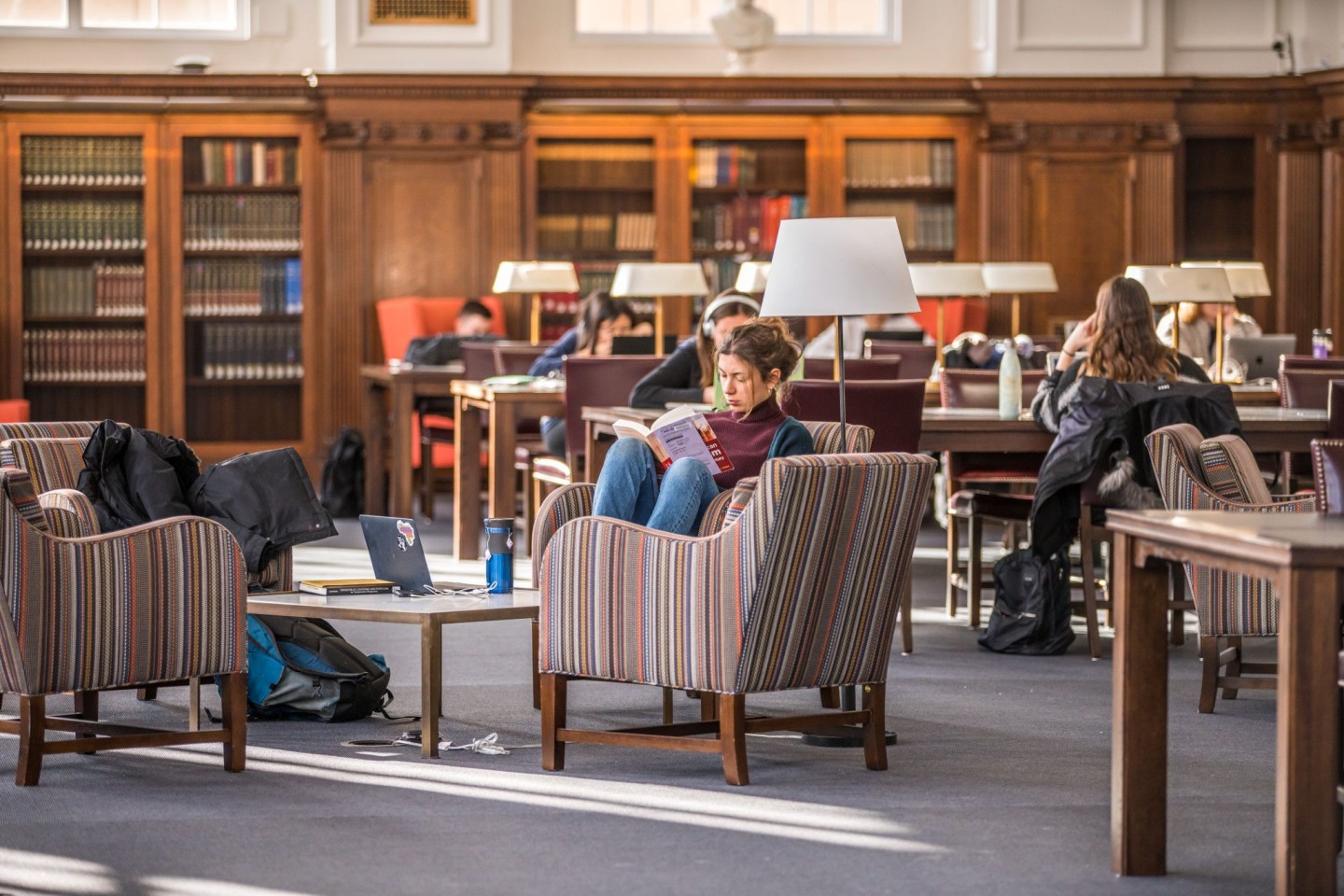 Students studying in a library.
